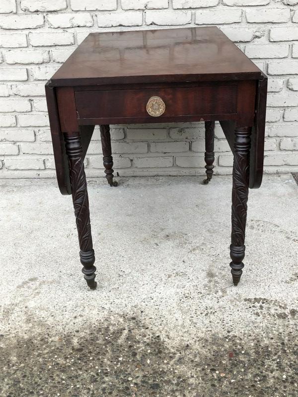 SHERATON MAHOGANY CARVED LEG DROP LEAF TABLE, WITH ONE: SHERATON MAHOGANY CARVED LEG DROP LEAF TABLE, WITH ONE DRAWER THAT OPENS, OTHER A FALSE DRAWER, BOTH WITH EARLY GLASS KNOBS. FROM LOCAL ESTATE, GOOD OVERALL CONDITION, MEASURES 37" LONG X 22.5" WIDE X
