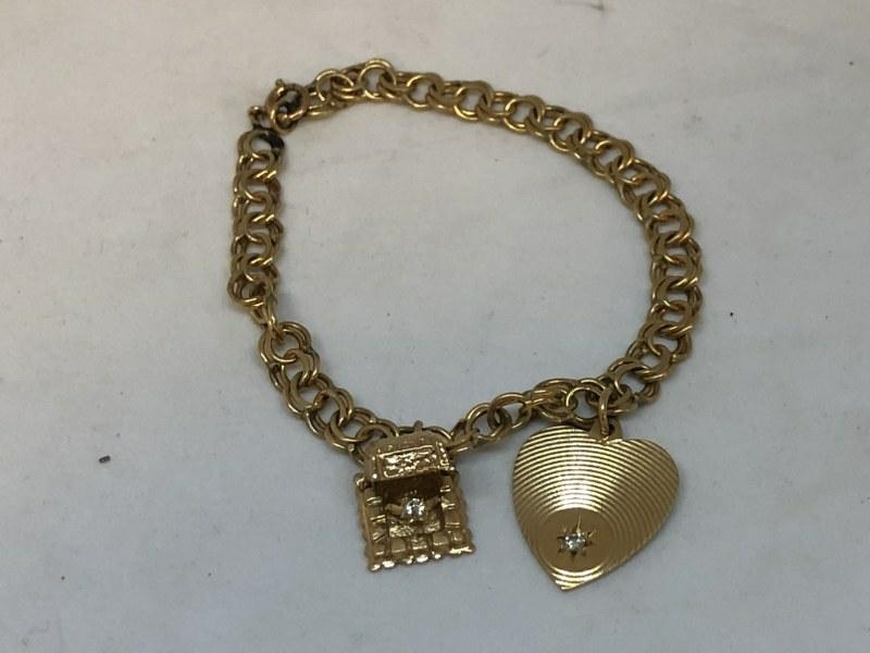14K CHARM BRACELET WITH HEART & DIAMOND CHIP & RING BOX: 14K CHARM BRACELET WITH HEART & DIAMOND CHIP & RING BOX WITH DIAMOND RING INSIDE WHEN YOU OPEN IT, POSSIBLY WAS AN ENGAGEMENT GIFT. WEIGHS 7.0 DWT. FROM BROOKLYN, N.Y. ESTATE.