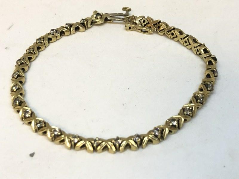 14K TENNIS BRACELET WITH DIAMOND CHIPS, FROM BROOKLYN,: 14K TENNIS BRACELET WITH DIAMOND CHIPS, FROM BROOKLYN, N.Y. ESTATE, MEASURES 7 1/8" LONG, WEIGHS 6.4 DWT.