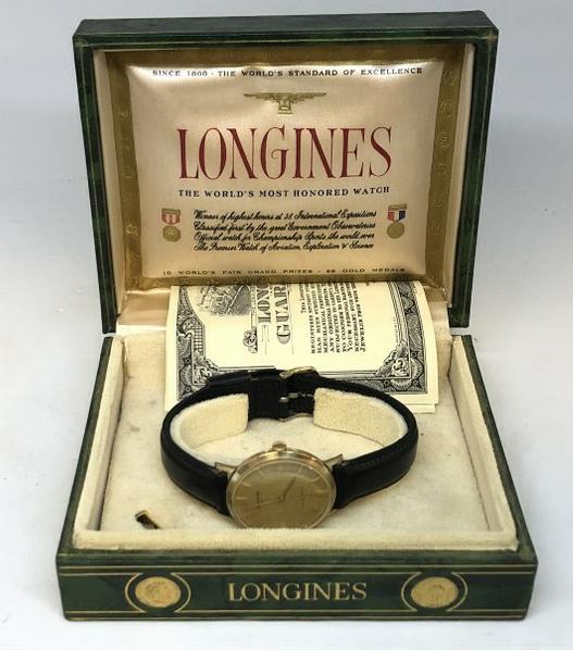 LONGINES MENS 1960'S ERA WRISTWATCH, GOLD FILLED, IN: LONGINES MENS 1960'S ERA WRISTWATCH, GOLD FILLED, IN ORIGNAL BOX, FROM LOCAL ESTATE. RUNNING, BUT I WOULD THINK IT WOULD BE IN NEED OF A CLEANING POSSIBLY. LEATHER BAND.