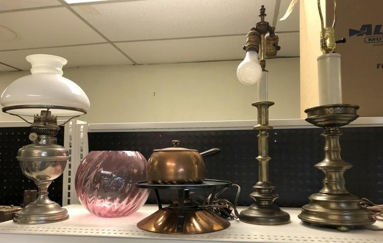 (5) PC. MISC. ESTATE LOT INCL. 2 METAL CANDLES STICK: (5) PC. MISC. ESTATE LOT INCL. 2 METAL CANDLES STICK LAMPS, CRANBERRY LAMP SHADE, NICKEL PLATED OIL LAMP & MID CENTURY COPPER FONDUE POT ON STAND. ALL IN GOOD ESTATE CONDITION.