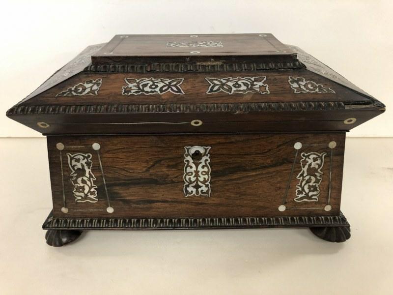 OLDER ROSEWOOD WITH MOTHER OF PEARL INLAY JEWELRY BOX: OLDER ROSEWOOD WITH MOTHER OF PEARL INLAY JEWELRY BOX OR TRAVELING ORGANIZER, HAS PULLOUT INSIDE FOR PAPERS, LIFT TOP TRAY FOR STORAGE UNDERNEATH. GILT TOOLED LEATHER INSIDE, RING HANDLES, CARVED FEET
