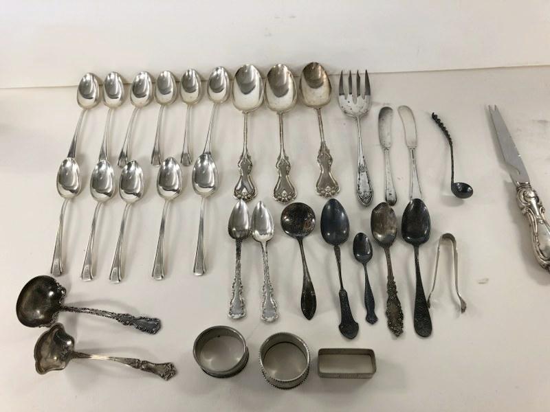 ESTATE LOT OF STERLING SILVER, INCLUDING FLATWARE,: ESTATE LOT OF STERLING SILVER, INCLUDING FLATWARE, SERVING UTENSILS, NAPKIN RINGS, ETC. WEIGHS 29.02 TROY OUNCES FIGURING HALF TROY OUNCE FOR THE HANDLE ON A SERVING KNIFE.