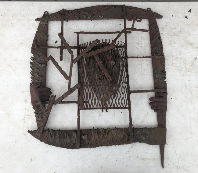 OUTSIDER ART - FOLK ART IRON HANGING SCULPTURE, WITH: OUTSIDER ART - FOLK ART IRON HANGING SCULPTURE, WITH COPPER FACE IN CENTER, BEAUTIFULLY WORN PATINA TO THE IRON, FOUND IN THE YARD OF THE BROOKLYN, N.Y. ESTATE WE ARE LIQUIDATING. MEASURES 26" X 20.25