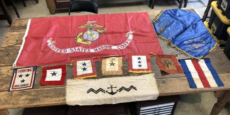 (11) PCS. WW II BANNERS AND RELATED, & SOME LATER: (11) PCS. WW II BANNERS AND RELATED, & SOME LATER INCLUDING LARGE RED MARINES BANNER. ONE SMALL BANNER IS TATTERED BADLY, FROM LOCAL ESTATE. ALSO INCLUDED A NYLON MERICAN FLAG, WITH FADED COLORS.