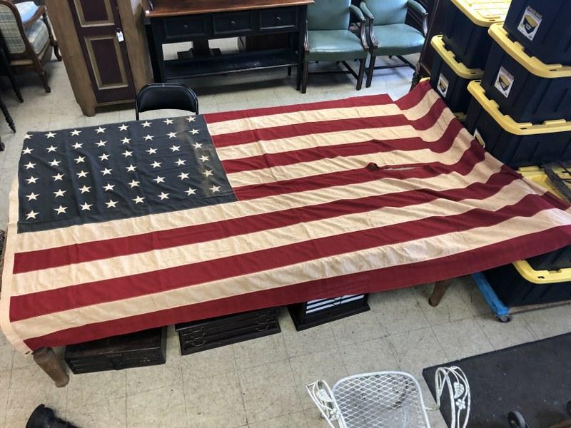 WW II (48) STAR AMERICAN FLAG, FROM ESTATE OF WW II: WW II (48) STAR AMERICAN FLAG, FROM ESTATE OF WW II VETERAN. HAS A SLIT IN CENTER, COTTOM MATERIAL, MEASURES 67" X 112".