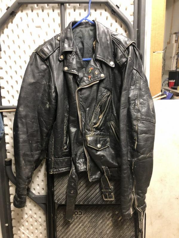 VINTAGE LEATHER MOTORCYCLE JACKET, THE LEATHER SHOP AT: VINTAGE LEATHER MOTORCYCLE JACKET, THE LEATHER SHOP AT SEARS, WORN, SCUFFED AND USED, GREAT LOOK. POCKETS BLOWN OUT AND BOTH ZIPPERS ON POCKETS NEED REPLACING. LOOKS LIKE SIZE 40â€¦.FROM LOCAL EST
