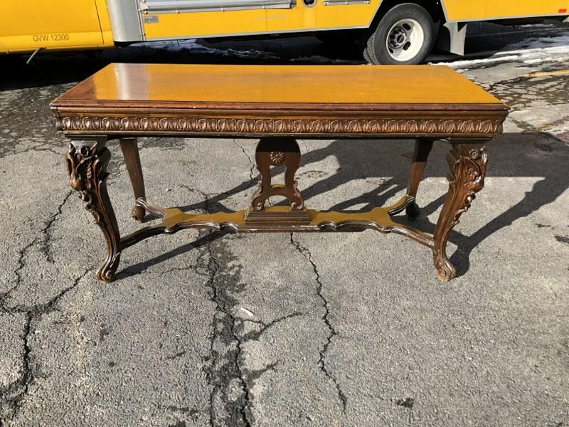WALNUT INLAID TOP, CARVED BASE CONSOLE-LIBRARY TABLE,: WALNUT INLAID TOP, CARVED BASE CONSOLE-LIBRARY TABLE, MISSING THE DRAWER, WAS UP AGAINST THE WALL SO NOT NOTICEABLE, CARVED BIRDS ON EACH LEG, CARVED APRON, ORIGINAL FINISH, MEASURES 59 1/2" W X 24 1/
