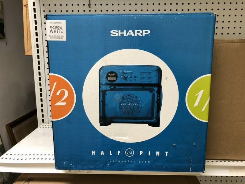 NEW IN BOX SHARP HALF PINT MICROWAVE OVEN MODEL R-120DW: NEW IN BOX SHARP HALF PINT MICROWAVE OVEN MODEL R-120DW (WHITE), FROM LOCAL ESTATE.