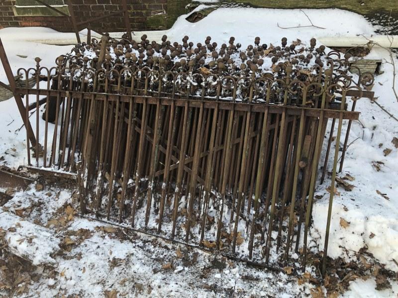 (16) SECTIONS OF OLD IRON DECORATIVE FENCING, WITH GATE: (16) SECTIONS OF OLD IRON DECORATIVE FENCING, WITH GATE & (12) POSTS. FROM THE BROOKLYN ESTATE OF ARCHITECTURAL ELEMENTS COLLECTOR & HOARDER. EACH SECTION APPROX. 44" HIGH X 86" WIDE. PICK UP IN BROOK