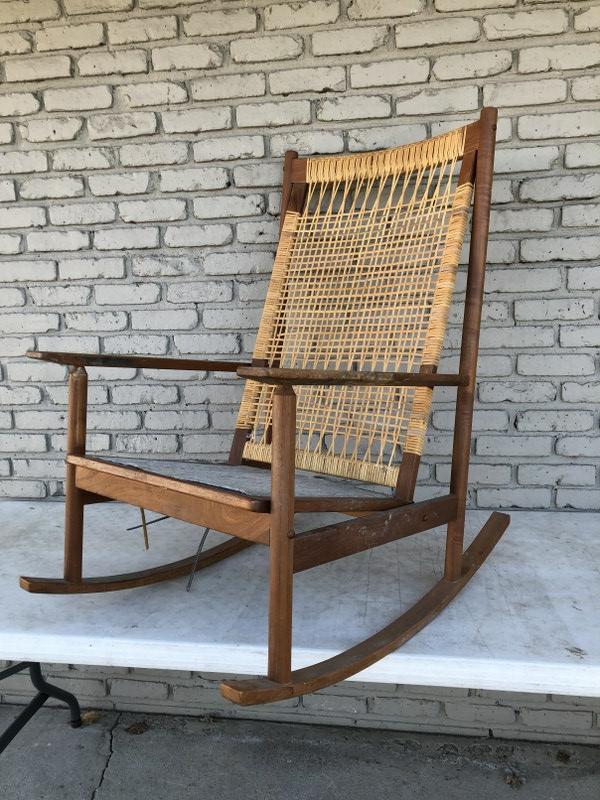 MID CENTURY ROCKING CHAIR W/CANE BACK, GOOD OVERALL: MID CENTURY ROCKING CHAIR W/CANE BACK, GOOD OVERALL CONDITION, NEEDS CLEANING, IN AS FOUND ESTATE CONDITION, WEAR TO FABRICâ€¦