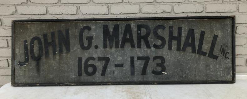 OLD SIGN JOHN G. MARSHALL INC. 167-173 BROOKLYN ESTATE: OLD SIGN JOHN G. MARSHALL INC. 167-173, FOUND IN THE CARRIAGE HOUSE OF BROOKLYN ESTATE WE ARE LIQUIDATION, GOOD LOOKING, ON GALVINIZED TIN, AND BLACK WOOD FRAME. MEASURES 60" X 18".