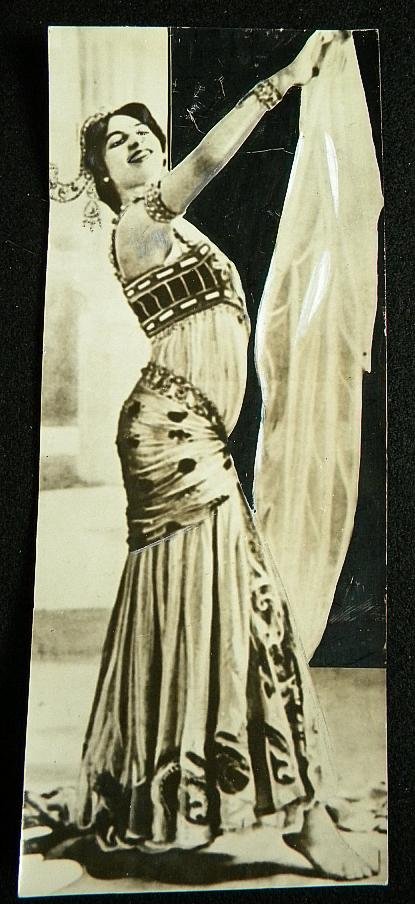 RARE MATA HARI PRESS PHOTOGRAPH OF THE FAMED DANCER: RARE MATA HARI PRESS PHOTOGRAPH OF THE FAMED DANCER & SPY. FROM 1931, NEWSPAPER PHOTO ATTACHED TO BACK. MEASURES 10 1/2" X 4 1/2"