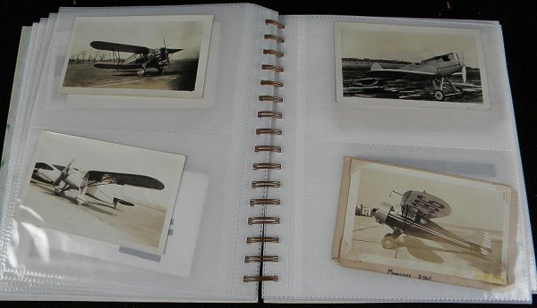 ALBUM OF OLDER AIRPLANE PHOTOGRAPHS IN SLEEVES. NI: ALBUM OF OLDER AIRPLANE PHOTOGRAPHS IN SLEEVES. NICE ALBUM SHOWING MANY DIFFERENT PLANES. PROBABLY OVER 150 IMAGES AND NEGATIVES.