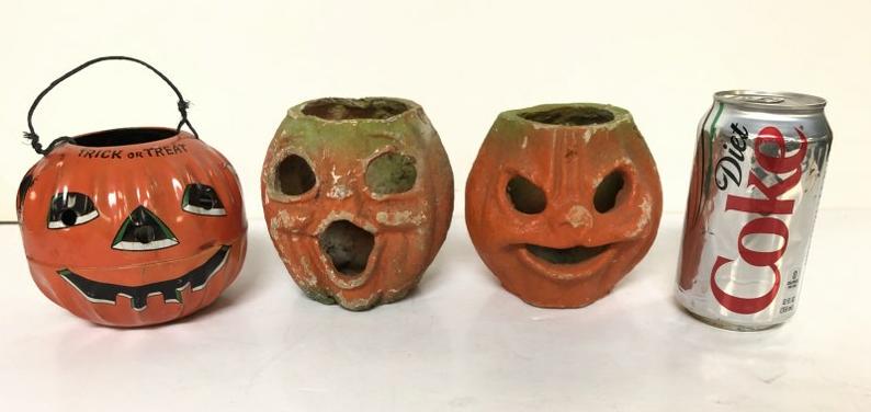 (3) SMALL OLD HALLOWEEN PUMKINS, INCLUDING 2: (3) SMALL OLD HALLOWEEN PUMKINS, INCLUDING 2 COMPOSITION (4.75" HIGH) & TIN ONE (4.5" HIGH) AS FOUND ESTATE CONDITION.