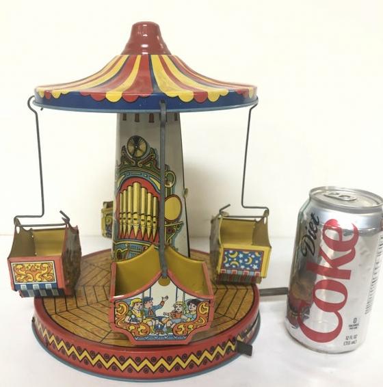 VINTAGE TIN LITHO MERRY GO ROUND, WORKING CONDITION, (1 of 3)