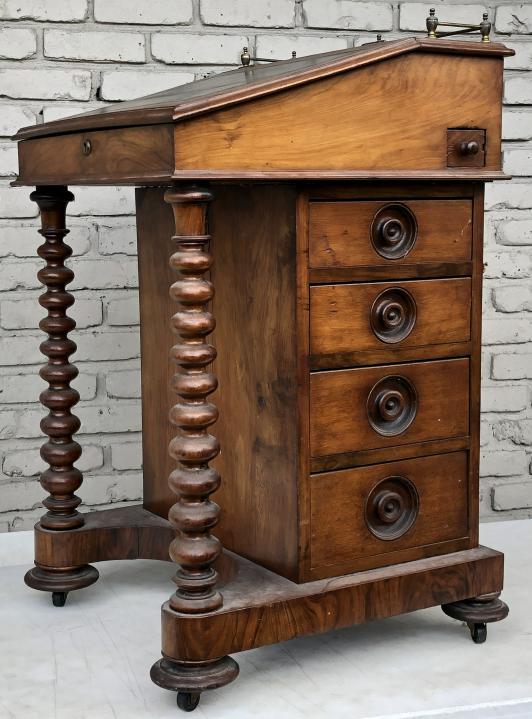 EARLY WALNUT & ROSEWOOD DAVENPORT DESK FROM HUDSON: EARLY WALNUT & ROSEWOOD DAVENPORT DESK FROM HUDSON VALLEY ESTATE, DRAWERS ON 1 SIDE AS PICTURED, LEATHER WRITING TOP, FULL DRAWER INTERIOR, BRASS GALLERY ON TOP, MEASURES 21.5" W X 22" DEEP, AND BACK 