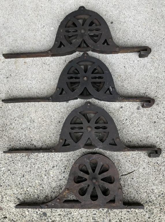 (4) IRON PULLEYS FROM ESTATE OF AWARD WINNING STAGE (1 of 4)