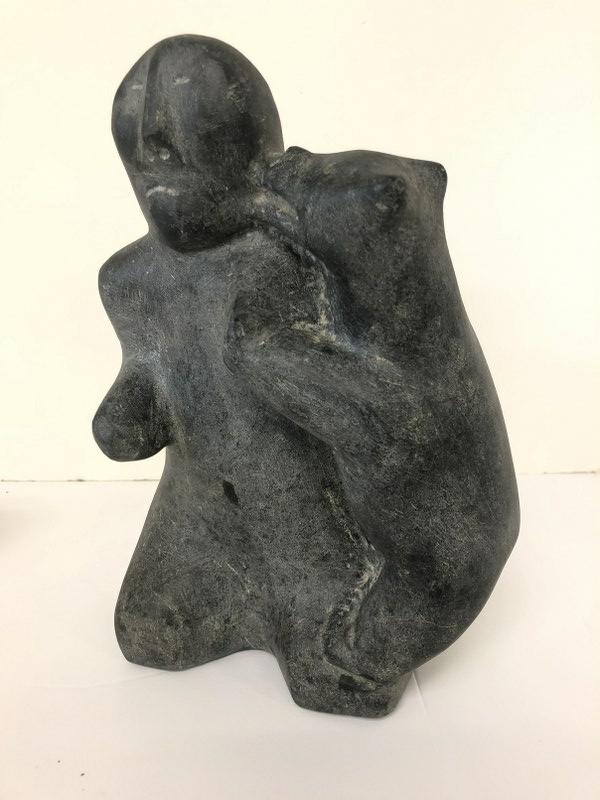 INUIT STONE CARVED FIGURE OF FULL SIZE BEAR AND MAN, (1 of 6)