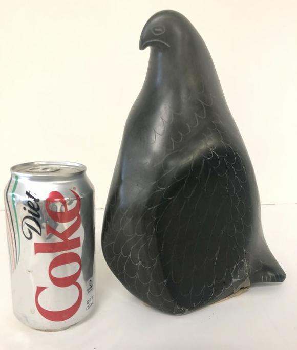 JOBIE CROW BELCHER ISLAND CARVED BIRD, GREENISH COLOR: JOBIE CROW BELCHER ISLAND CARVED BIRD, GREENISH COLOR STONE, IN VERY NICE CONDITION, MEASURES 9.5" HIGH X 6.5" FRONT TO BACK. HAS PAPER LABEL ON BOTTOM AS PICTURED, FROM NYC ESTATE OF EVELYNE DAITZ, F