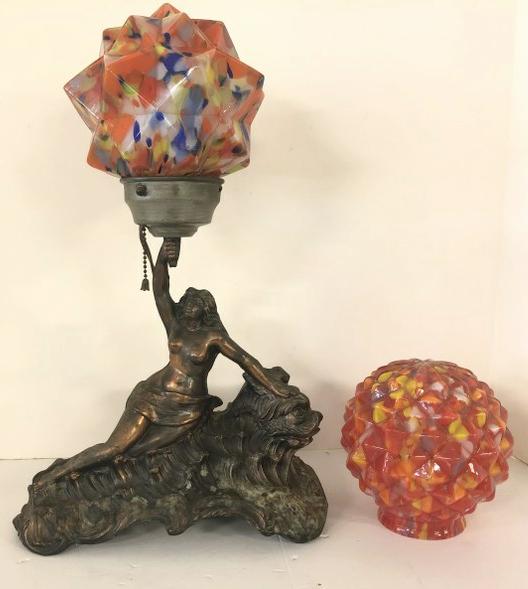 DECO METAL FIGURAL TOPLESS WOMAN ON DOLPHIN TABLE LAMP,: DECO METAL FIGURAL TOPLESS WOMAN ON DOLPHIN TABLE LAMP, WITH END OF DAY SHADE, AND ANOTHER EXRA SHADE, FROM LOCAL HUDSON VALLEY ESTATE, NO DAMAGE, NORMAL WEAR TO PATINA, MEASURES 12" ACROSS & 19.5" HI