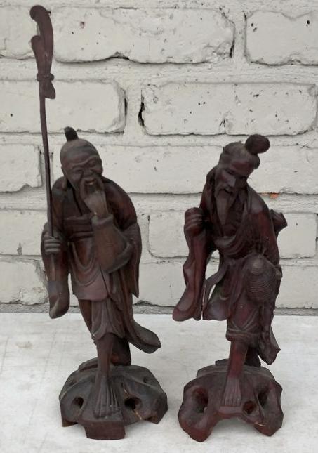 (2) CARVED WOOD ASIAN FIGURES, ONE HOLDING STAFF WITH (1 of 3)