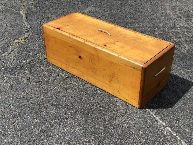 WOOD STORAGE BOX IN GOOD CONDITION. MEASURES 32.5" W x: WOOD STORAGE BOX IN GOOD CONDITION. MEASURES 32.5" W x 13" D x 12" H.