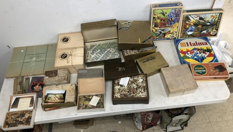 LOT OF MOSTLY WOOD PUZZLES, FROM NYC ESTATE OF: LOT OF MOSTLY WOOD PUZZLES, FROM NYC ESTATE OF COLLECTOR DEALER, MOST WITH NOTES IN THEM WITH PICTURES, IF A PIECE IS MISSING, ETC. GOOD LOT TO SORT OUTâ€¦.THIS LOT IS JUST AS WE FOUND IT IN A BLA