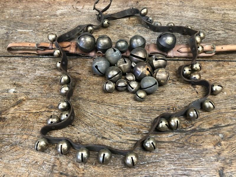 LOT OF OLD SLEIGH BELLS INCLUDING A LONG LEATHER (1 of 6)
