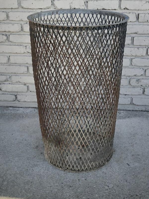 INDUSTRIAL MUNICIPAL METAL WASTE CAN, FROM HUDSON: INDUSTRIAL MUNICIPAL METAL WASTE CAN, FROM HUDSON VALLEY ESTATE, GREAT WORN PATINA, STRUCTURALLY SOUND, MEASURES 31" HIGH X 19.25" ACROSS.