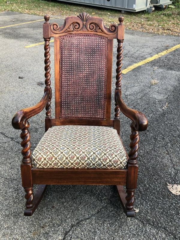 Fancy walnut cane-back rocking chair.: Fancy walnut cane-back rocking chair.