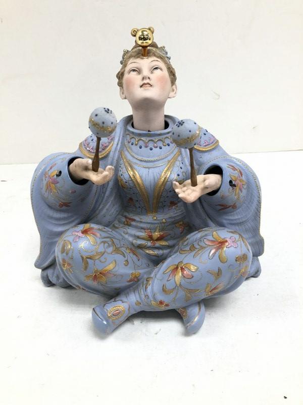 Older Asian nodder juggler with moveable head and (1 of 2)