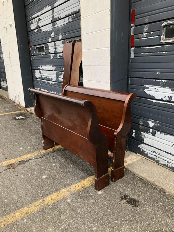 Period Empire sleigh bed from local estate,: Period Empire sleigh bed, from local estate, clean, structurally sound. Measures 51" across x 39" high.