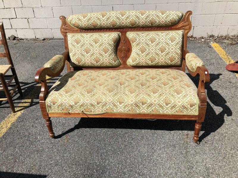 Circa 1910 carved settee, almost Eastlake feel, structurally sound, fabric in good condition.: Circa 1910 carved settee, almost Eastlake feel, structurally sound, fabric in good condition. Measures 48" wide x 36" igh x 26" deep.