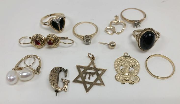 Estate lot 14K jewelry to include rings, charms, earrings, etc. As pictured it weighs 12.7 (1 of 4)