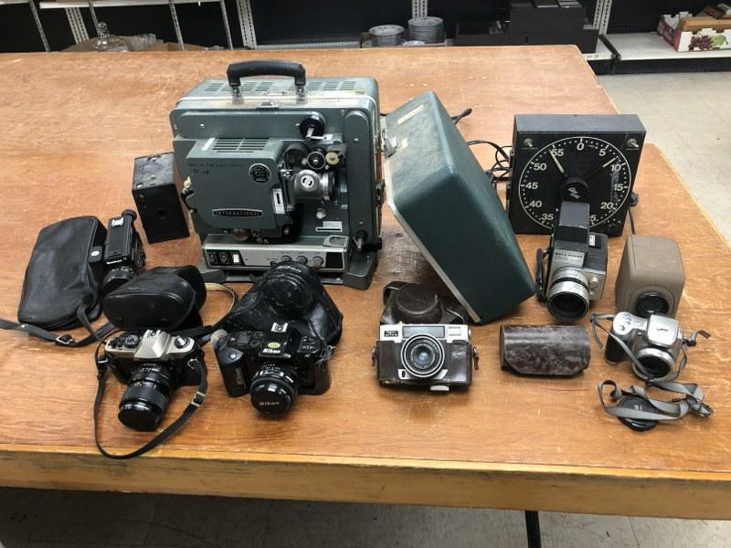 Estate lot cameras, movie projector, movie cameras, timer, etc. From local estate, just as we found (1 of 13)