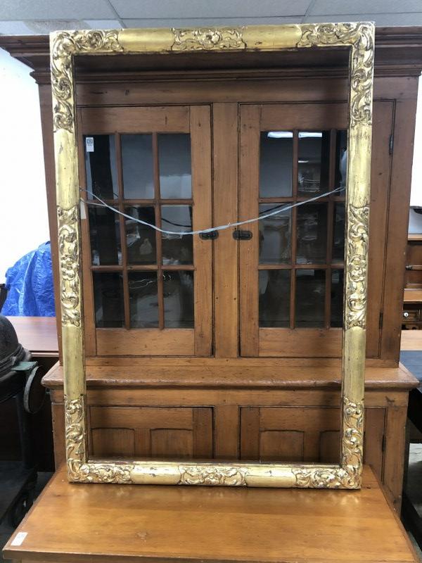 Large gold carved frame, has gilt wearing in spots for a nice patina, inner measurements are 52.25" (1 of 7)
