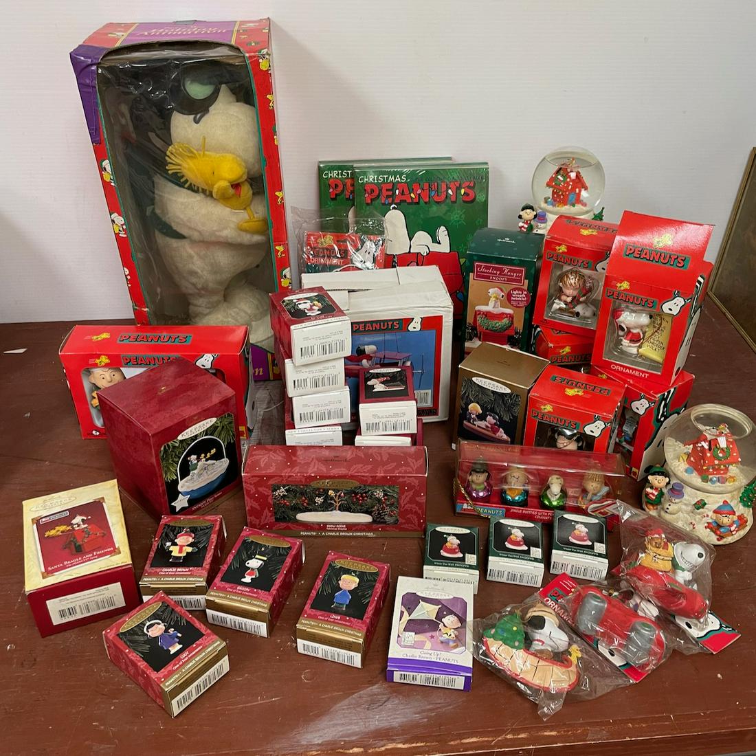 Snoopy/Peanuts Christmas lot. Lot includes a giant Santaâ€™s Best Holiday Animation of Snoopy and (1 of 11)
