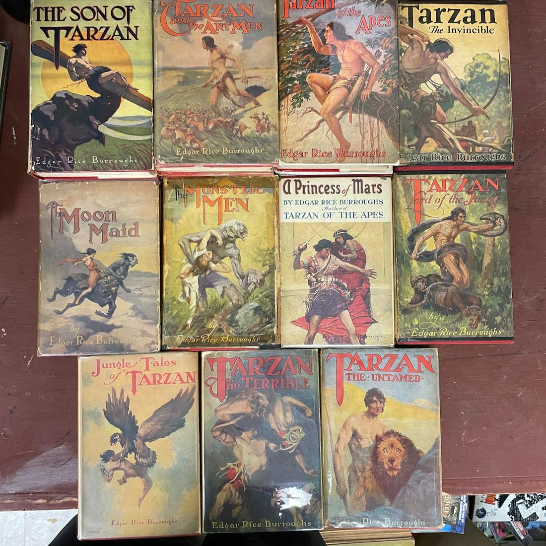 16 Edgar Rice Burroughs Grosset & Dunlap dust jacket. Every one of these has a dust jacket with the: 16 Edgar Rice Burroughs Grosset & Dunlap dust jacket. Every one of these has a dust jacket with the book catalog printed on the reverse and significant wear, making it more likely that they are origin