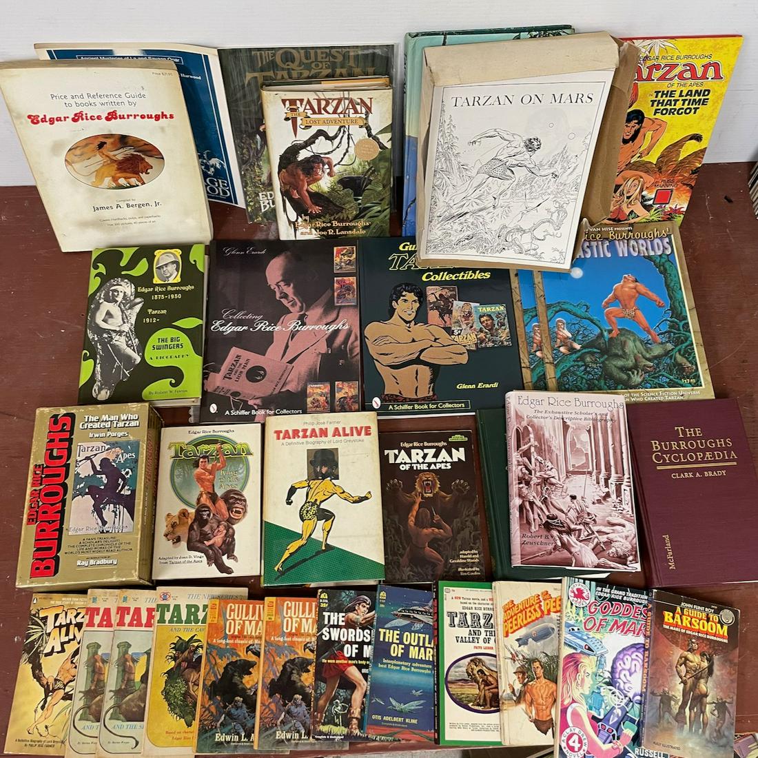 65+ Edgar Rice Buroughs related books. This lot includes books about Edgar Rice Burroughs, books: 65+ Edgar Rice Buroughs related books. This lot includes books about Edgar Rice Burroughs, books featuring the worlds he created, and the collectibles generated by his empire. Among other things, it i