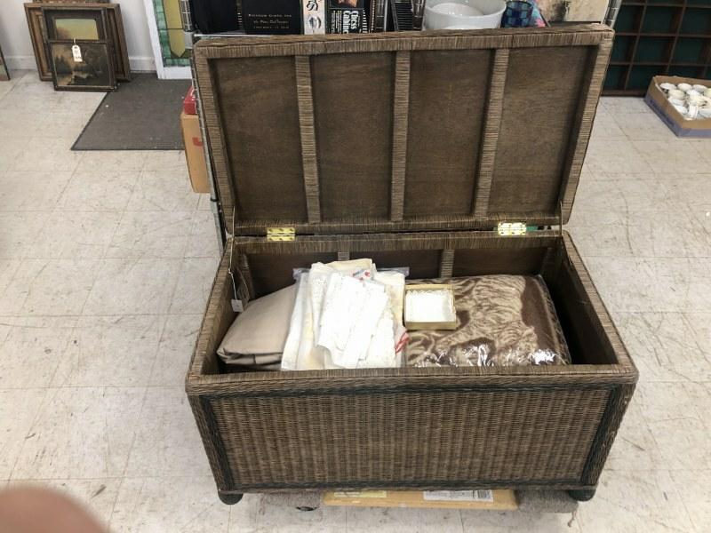 Contemporary wicker storage chest with misc. estate textiles, from local estate. (1 of 6)