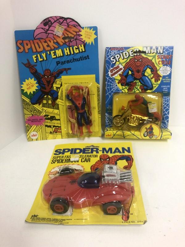(3) SPIDERMAN toys in original unopened packages , all copyrighted