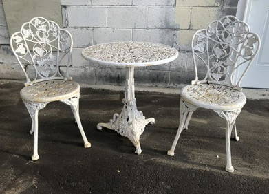(2) cast iron garden chairs with round pedestal table, decorative leaf design, table base has leaves (1 of 6)
