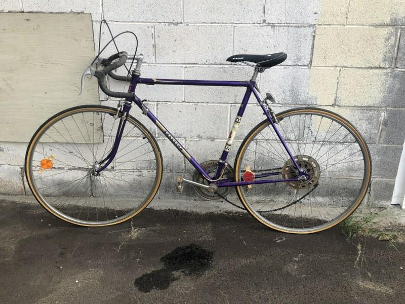 Vintage Peugot bicycle, found hanging in estate garage, some surface rust, chain off sprocket, weels: Vintage Peugot bicycle, found hanging in estate garage, some surface rust, chain off sprocket, weels turn freely. My guess is 1970's or so.