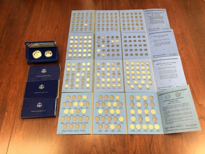 Estate lot coins including (4) United States Liberty silver dollar & half dollar sets in boxes and (1 of 8)