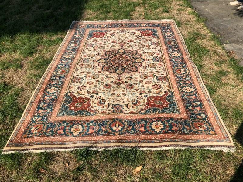 Larger estate handmade oriental rug, measures 113.5" x 76", crem background in center, overall nice (1 of 3)