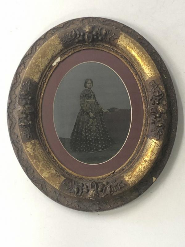 Hand Painted tintype of African American young woman, sealed verso, frame measures 14.5" x 12.5".: Hand Painted tintype of African American young woman, sealed verso, frame measures 14.5" x 12.5". From the estate collection of Richard G. Miller's 19th & 20th century hand painted, coloured & tinted 