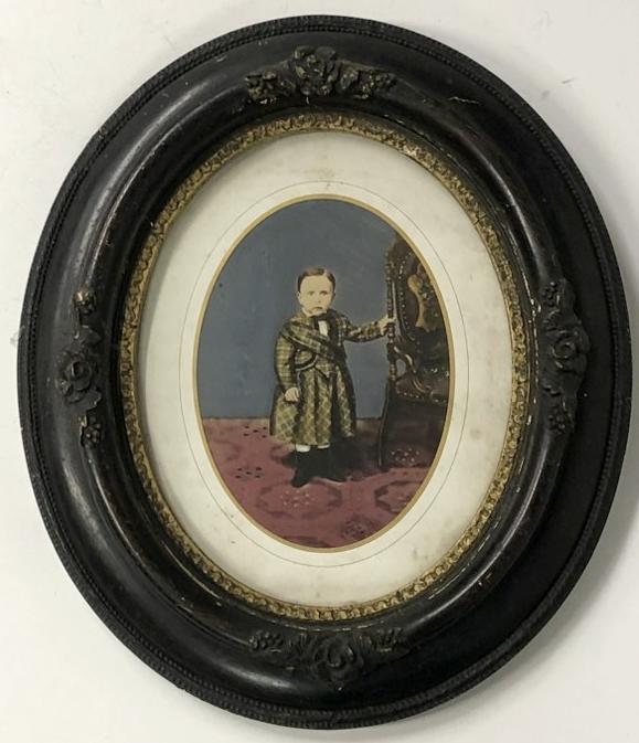 Hand Painted tintype young boy robe like outfit, in period frame that measures 15" x 12". Sealed on: Hand Painted tintype young boy robe like outfit, in period frame that measures 15" x 12". Sealed on verso. From the estate collection of Richard G. Miller's 19th & 20th century hand painted, coloured 