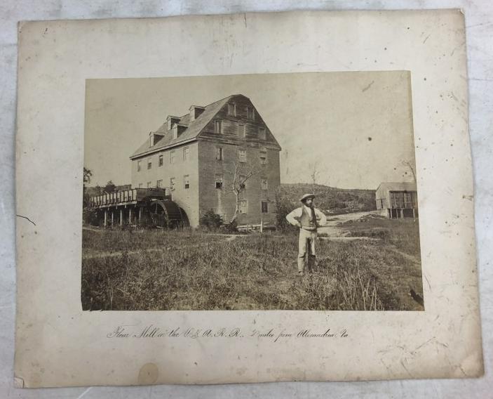 Civil War albumen attributed to A J Russell, titled Flour Mill on the Orange & Alexandria Railroad 2: Civil War albumen attributed to A J Russell, titled Flour Mill on the Orange & Alexandria Railroad 2 miles from Alexandria, Virgina. Measures 8.75" x 12.5" on larger mount.