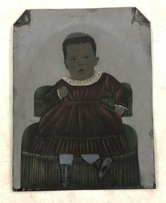 Hand Painted tintype of African American child, measures 8.25" x 6.50 . From the estate collection: Hand Painted tintype of African American child, measures 8.25" x 6.50 . From the estate collection of Richard G. Miller's 19th & 20th century hand painted, coloured & tinted photography.